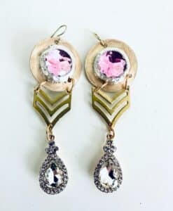 Elegant dangle earrings with pink stones and crystal teardrop charms.