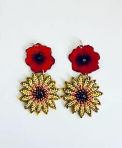 Handcrafted earrings featuring red poppy and beaded sunflower designs.
