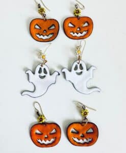 Halloween-themed earrings with pumpkins and ghosts.