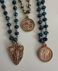 Blue beaded rosaries with gold medals